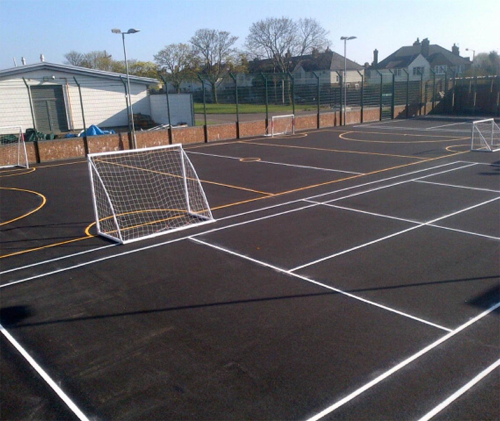 Colourful thermoplastic playground markings installed by Uniplay