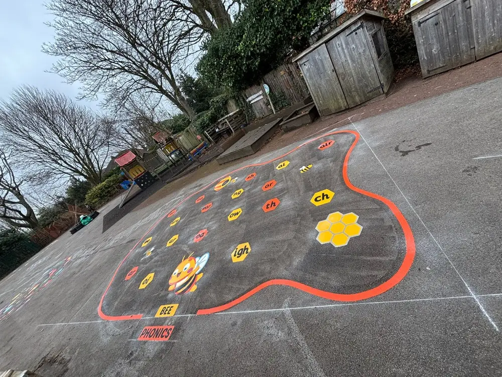 Bee Phonics thermoplastic playground marking at a UK school