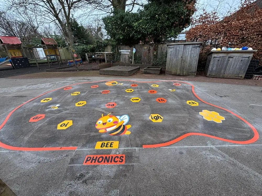 Bee Phonics thermoplastic playground marking at a UK school