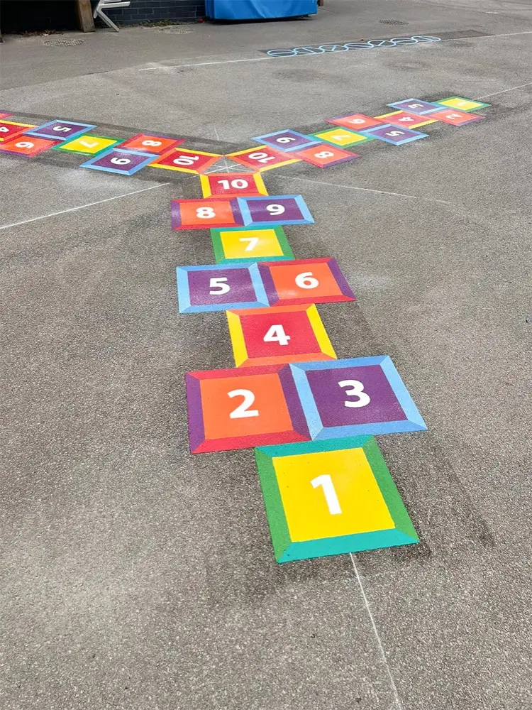 Three-way hopscotch thermoplastic marking on a school playground