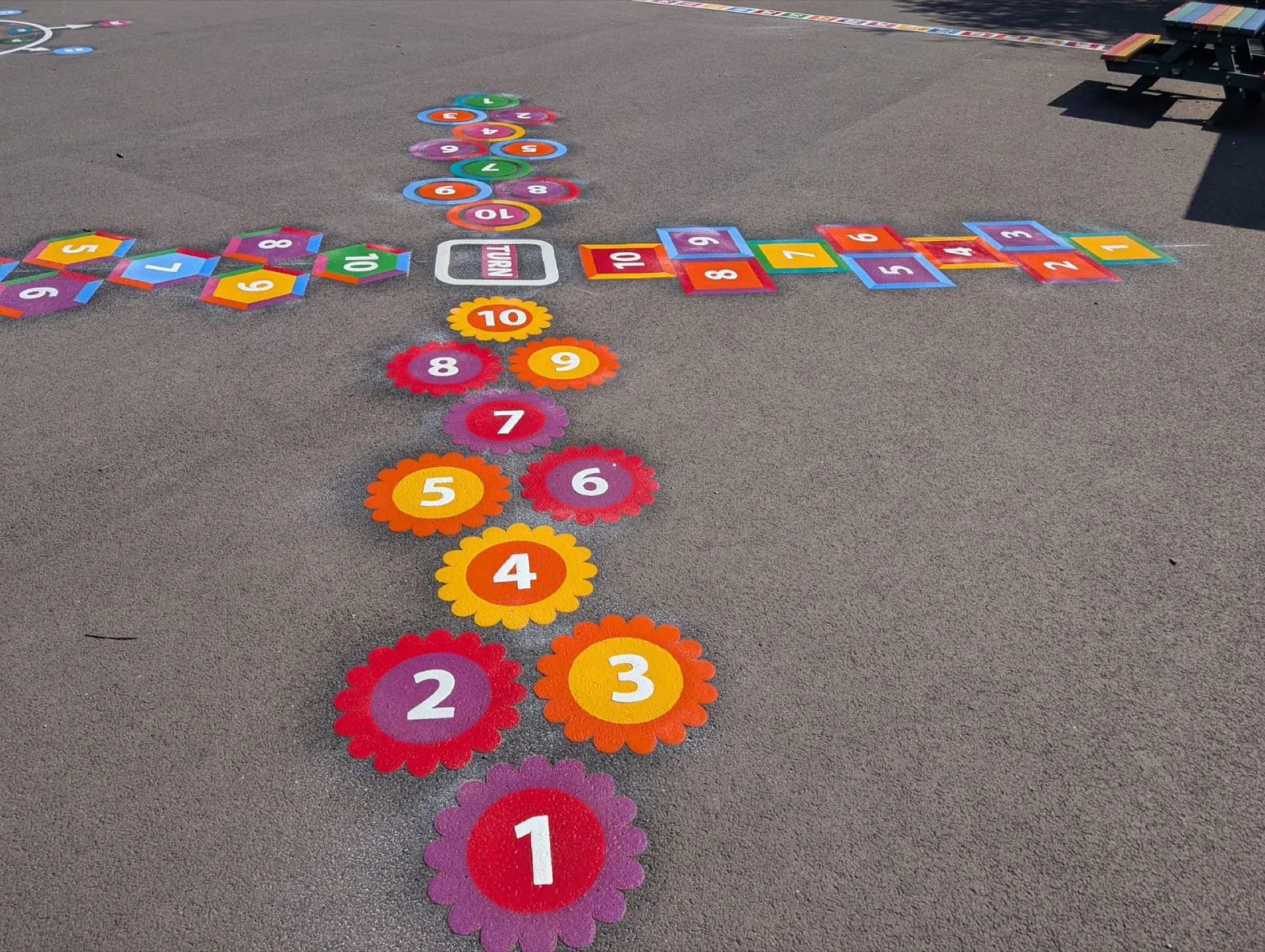 Real hopscotch playground markings installed on a school playground