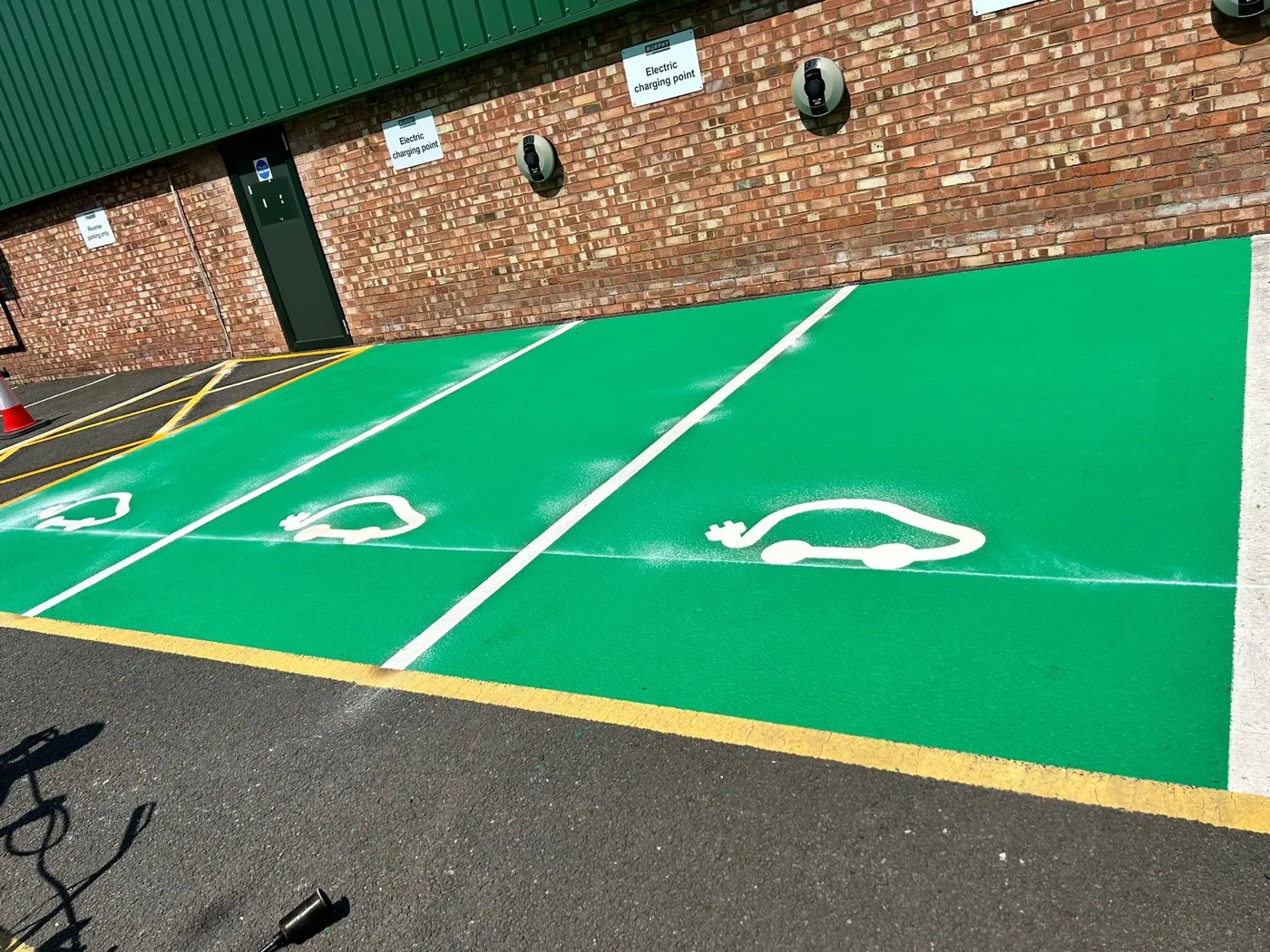 Disabled bay and hatched-zone car park markings by Uniplay