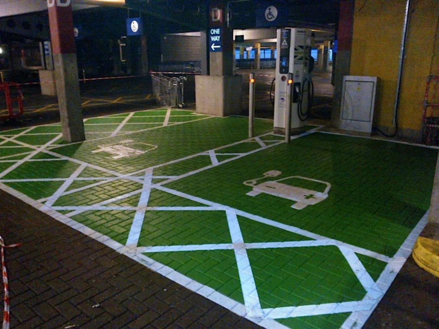 Car park line markings and directional arrows in thermoplastic