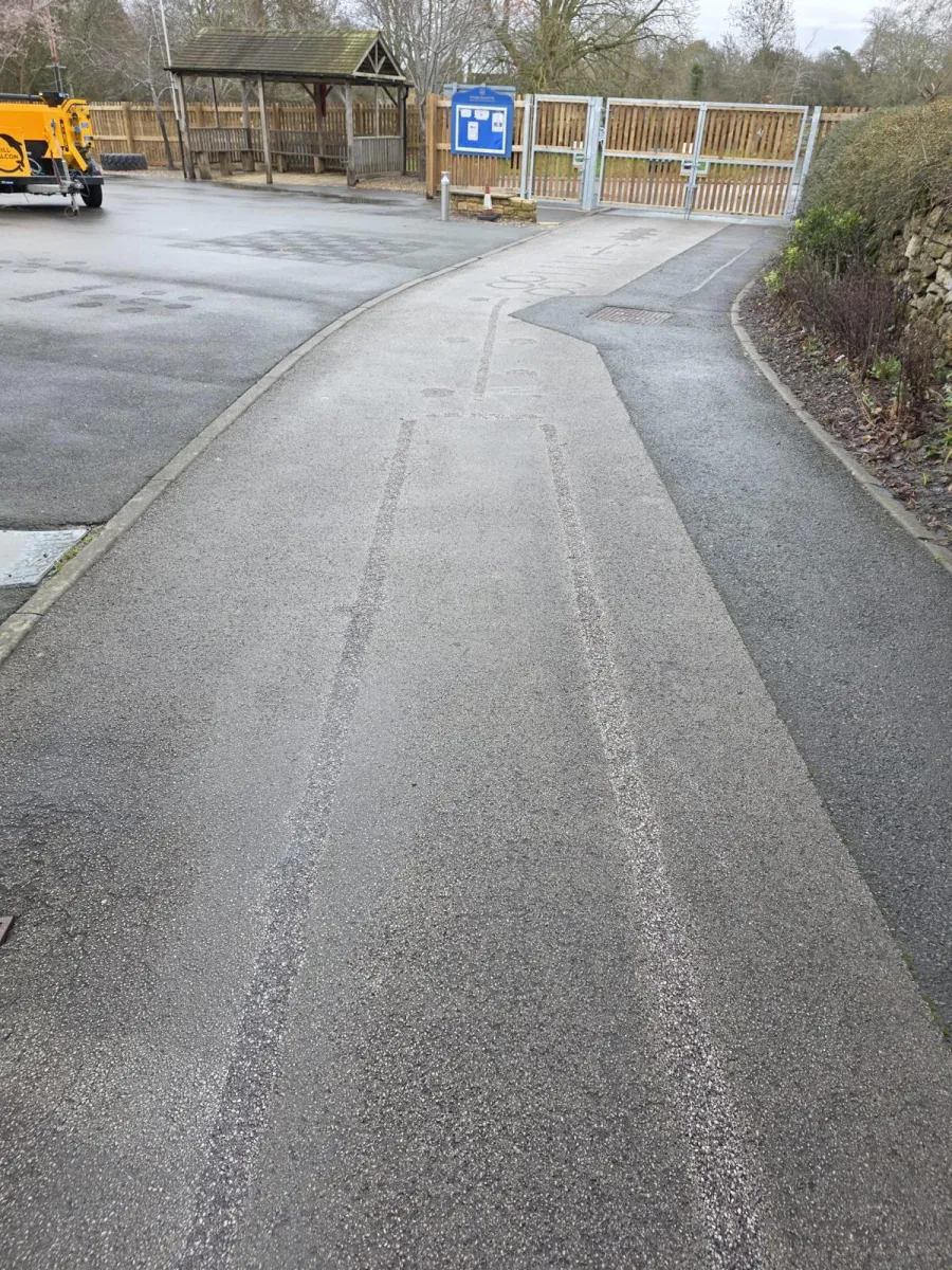 Specialist marking removal clearing a tarmac surface