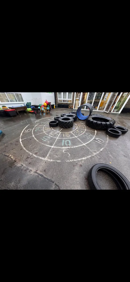 Playground marking removal in progress, lifting worn thermoplastic