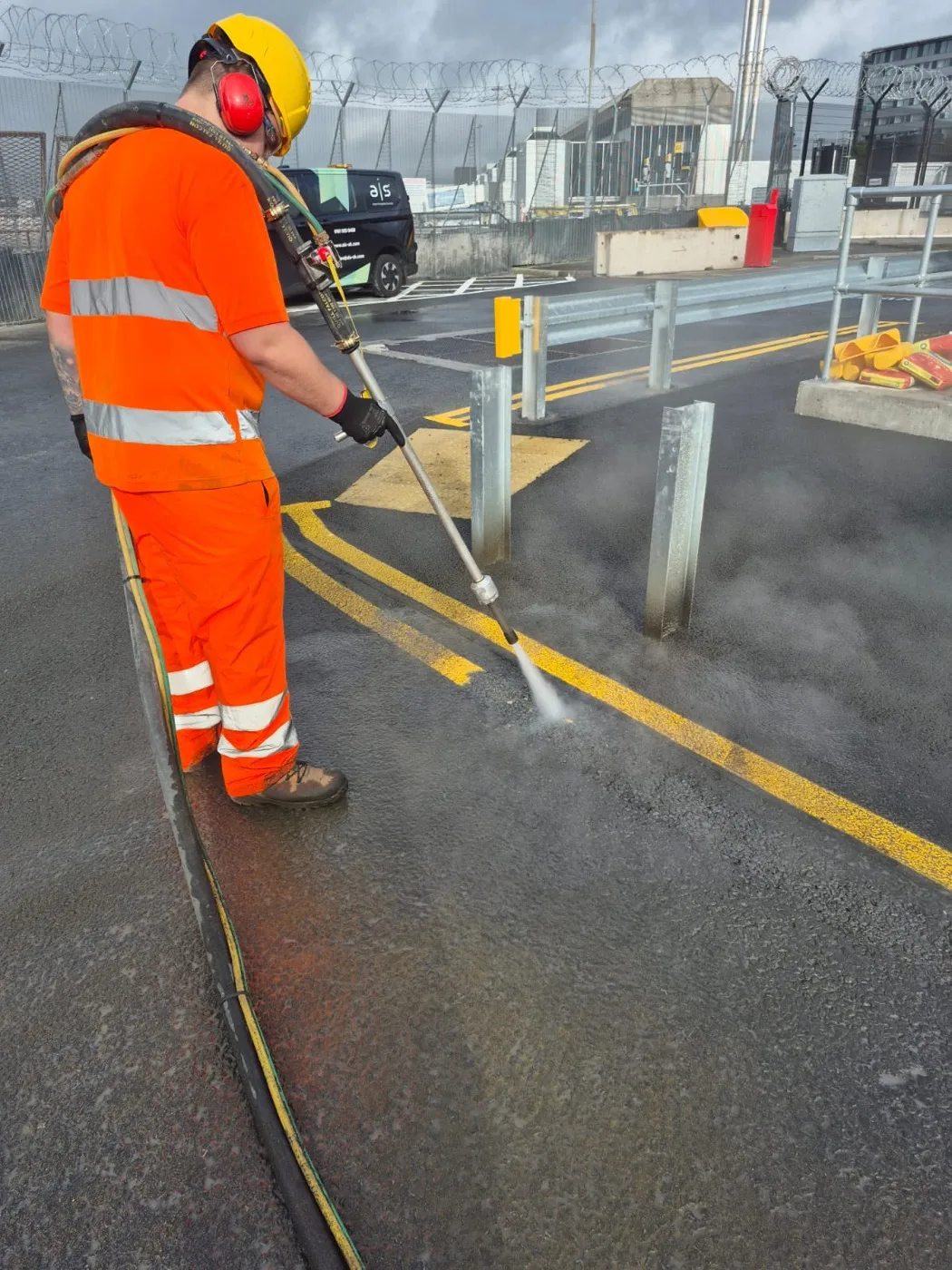 UHP water blasting lifting old thermoplastic without damaging the tarmac